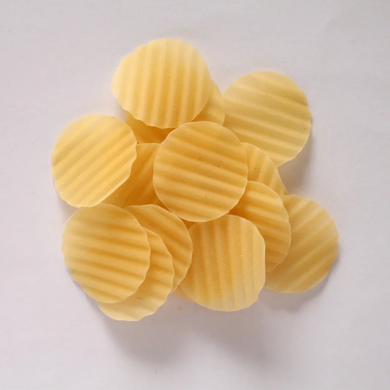 Flaky snack pellets made by snack pellets producton line